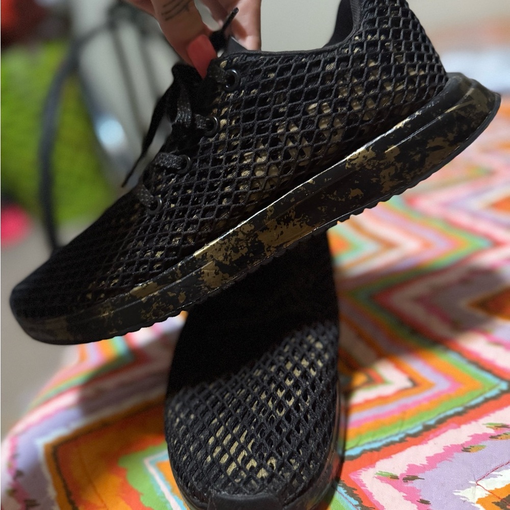 Black and Gold Mesh NO BULL running shoes